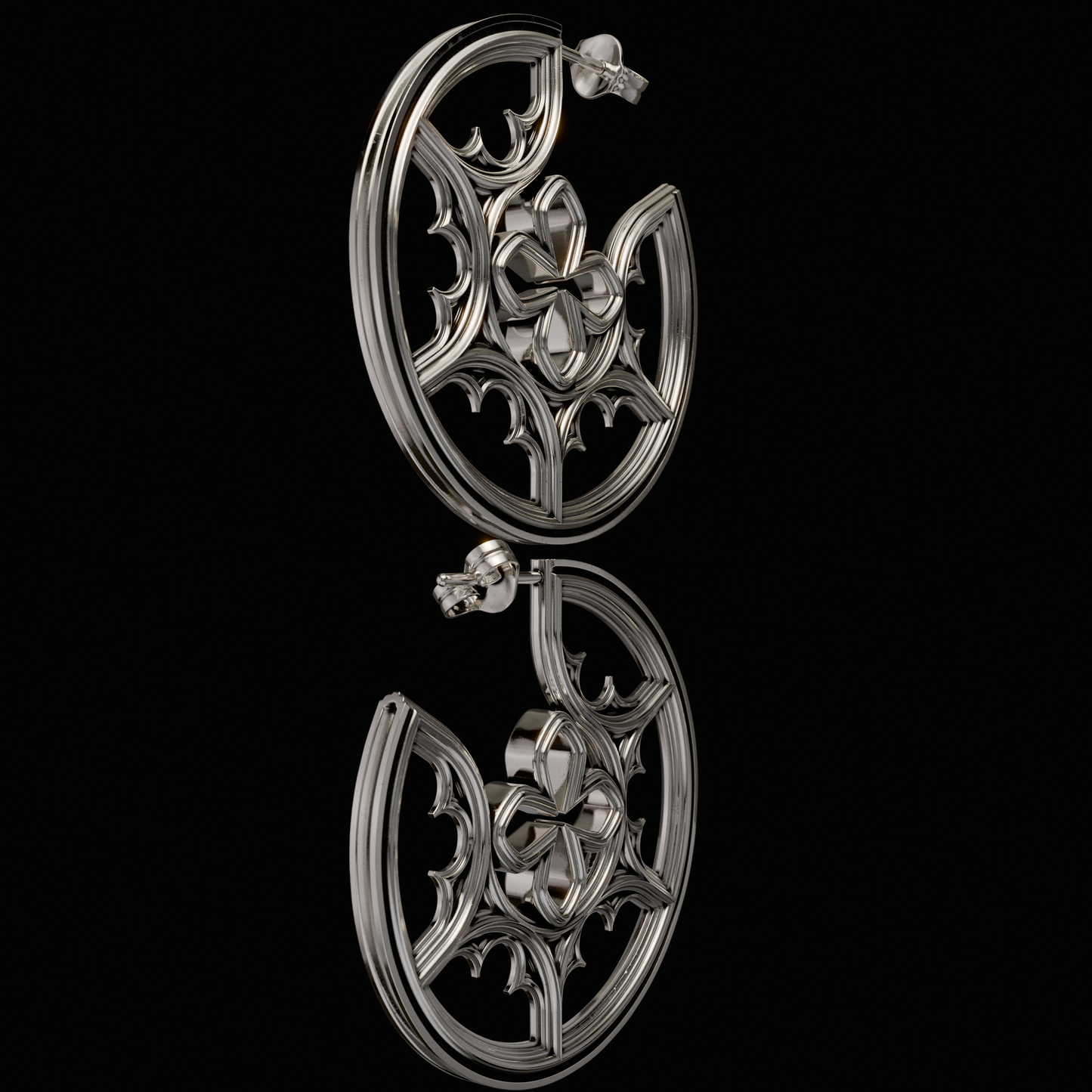 925 Sterling Silver Hoops. Make a statement with your side profile with Hoops from the Gothic Quarters Collection. Approximately 2in in diameter. One size. Each Hoop is independently polished, inspected and made to last a lifetime. Made in U.S.A.For a limited time only.