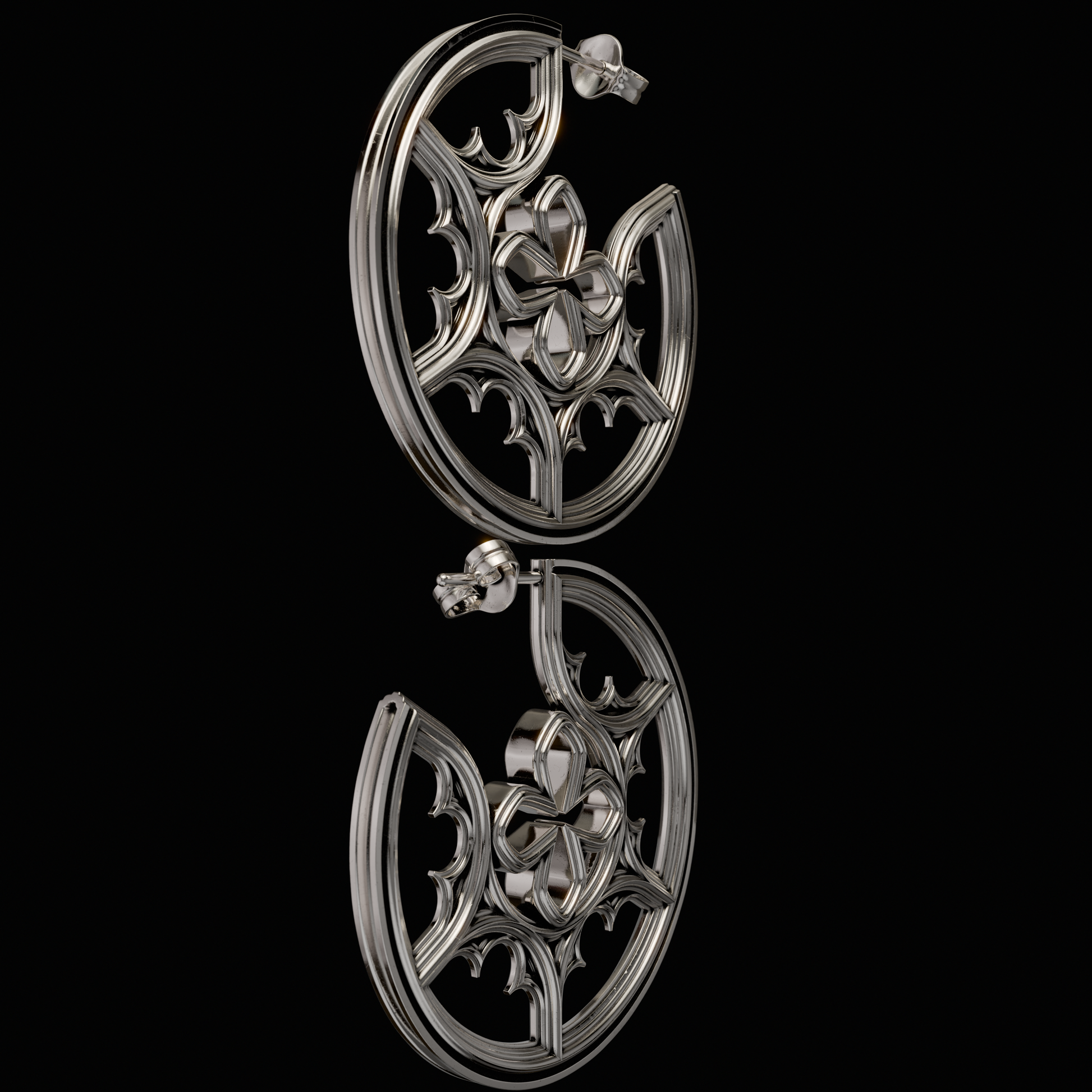 925 Sterling Silver Hoops. Make a statement with your side profile with Hoops from the Gothic Quarters Collection. Approximately 2in in diameter. One size. Each Hoop is independently polished, inspected and made to last a lifetime. Made in U.S.A.For a limited time only.